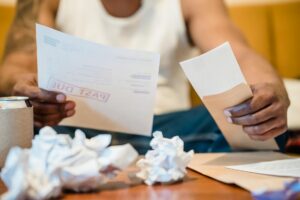 Hardship Programs: How to Pause Payments on Cards, Loans, and More - Featured image